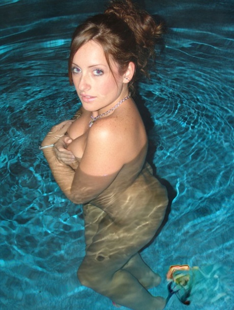 Redhead amateur Kylies Secret goes for a skinny dip in a safe for work manner