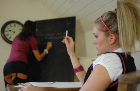 Emma Claire Jones & Miss Fifi smoke during a French tutoring lesson
