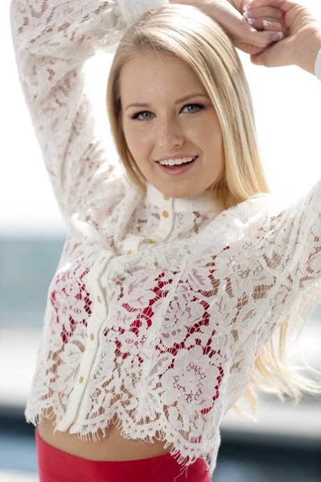 Exotic blonde pornstar Alexa Grace strips at the top of the building