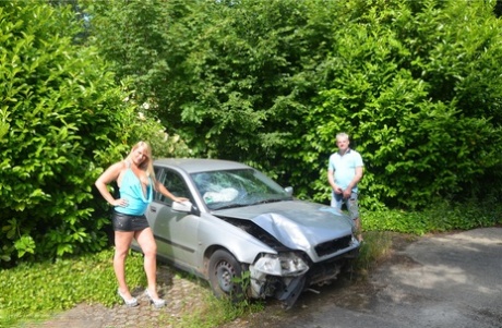 Older blonde Sweet Susi sucks a dick by a wrecked automobile in the backyard