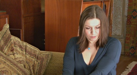 Caucasian student is taken over an old Headmaster's knee for a spanking