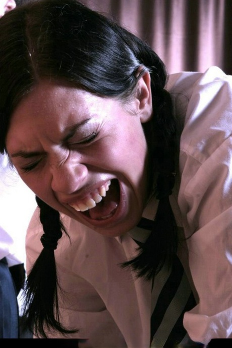 Schoolgirls have their bare asses turned red by their Headmaster