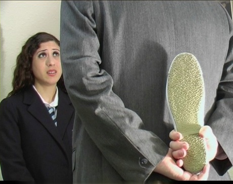 British student has her ass turned red while being spanked with a shoe