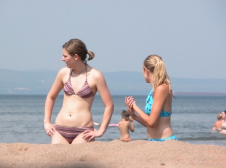Candid snaps of amateur girls wearing bikinis on public beaches