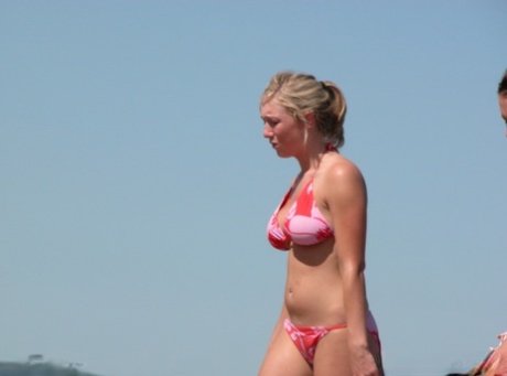 Candid snaps of amateur girls wearing bikinis on public beaches