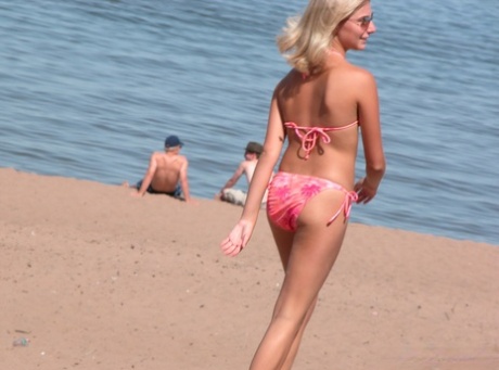 Candid snaps of amateur girls wearing bikinis on public beaches