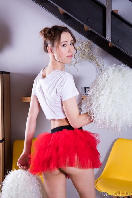Cute teen Rosalind sets her great body and tight slit free of cheer attire