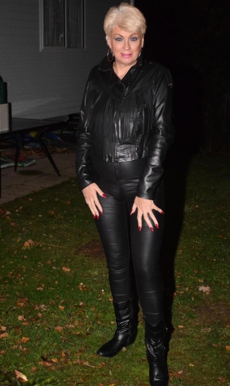 Older blonde Dimonty looses her natural tits from leather clothing at night