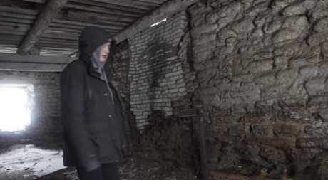 White girl Alexa pulls down her leggings to pee in an abandoned cellar