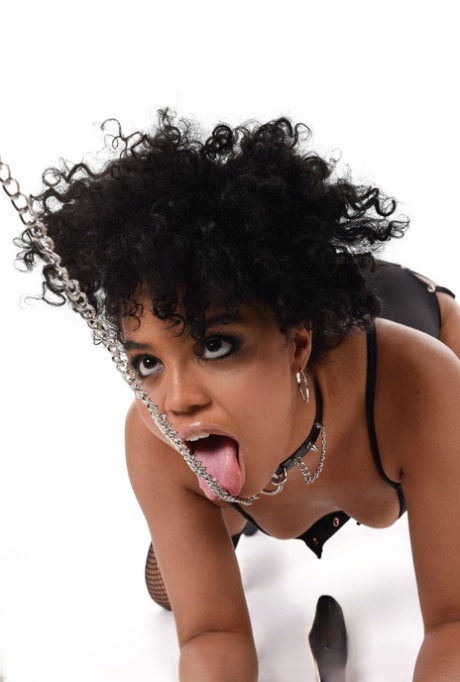 Brazilian solo model Selva Lapiedra wields a flogger before toying her cunt