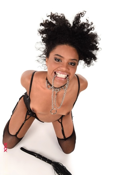 Brazilian solo model Selva Lapiedra wields a flogger before toying her cunt