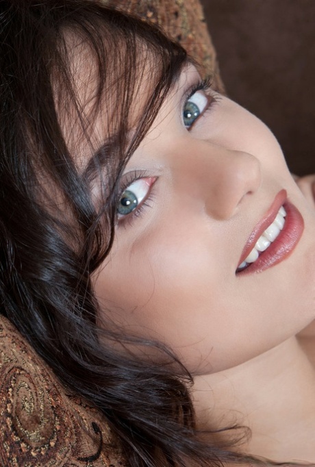 Brunette teen Chandra does away with a cocktail dress to pose in the nude