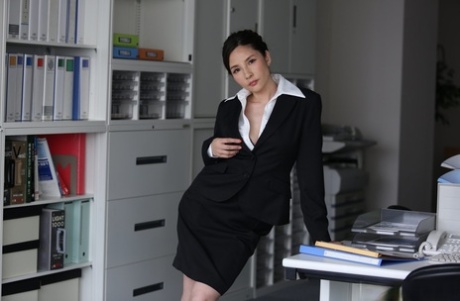 Hot Japanese secretary Ai Kamijou strips down to her pumps while at work