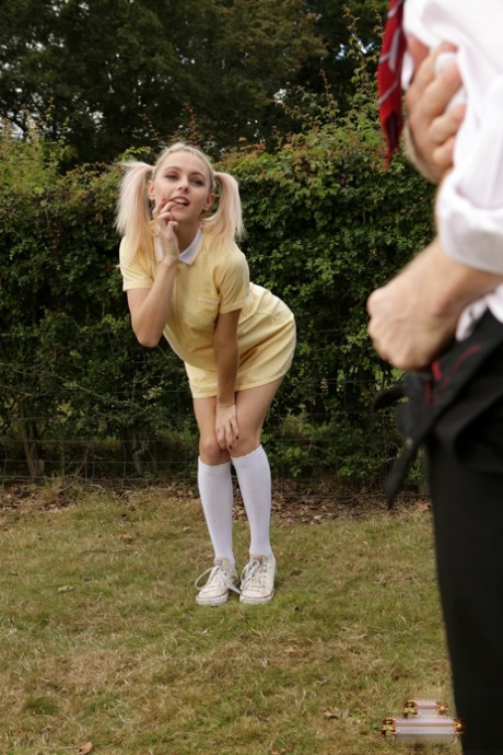 Blonde coed Chloe Toy watches a classmate jerk off in a yard