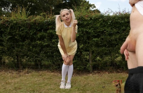 Blonde coed Chloe Toy watches a classmate jerk off in a yard