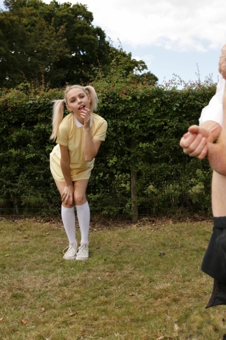 Blonde coed Chloe Toy watches a classmate jerk off in a yard