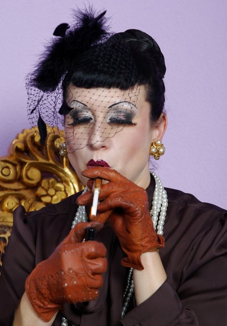 Fetish MILF on high heels smoking and uncovering her tempting curves