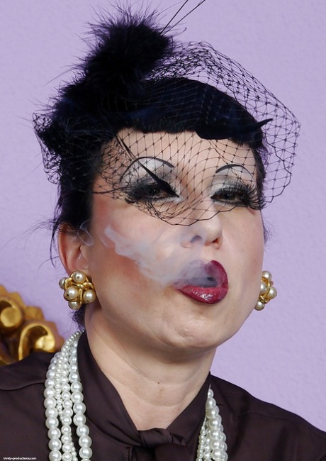 Fetish MILF on high heels smoking and uncovering her tempting curves