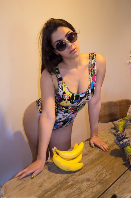 Teen with bubble ass & big tits Valentina Nappi strips & poses in a bodysuit