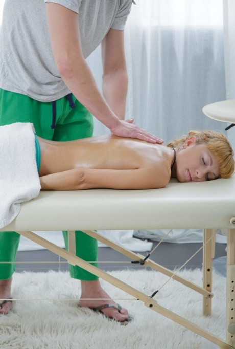 Skinny teen Lisa C gets oily massage before getting banged by a masseur
