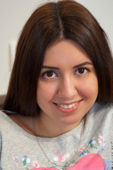Cute Russian teen Katty Diamond shows off her tanned body & fingers herself