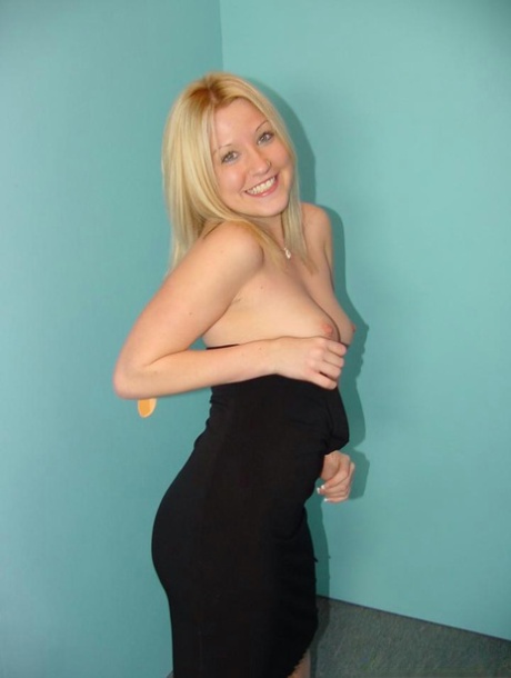 18+ teen Brittney Blue goes topless while giving a blowjob at a gloryhole