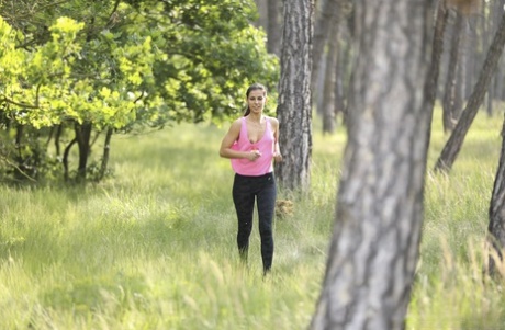 Cute teen Angela Allison unveils her small titties and masturbates in nature
