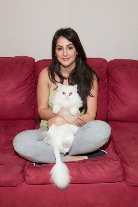 Israeli female Natali Gabban goes braless while modeling non nude in leggings