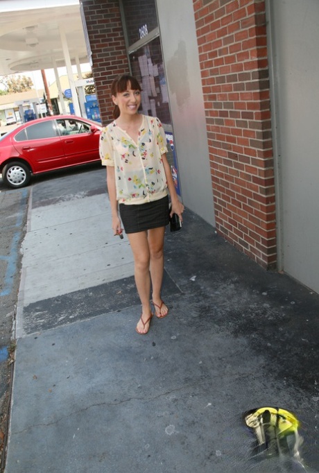 Brunette teen Lolita Haize peels in gloryhole space to masturbate on the loo
