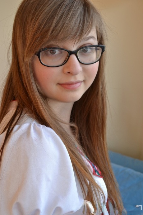 Adorable schoolgirl in glasses Lilah Demaray fingers  toys her chubby pussy