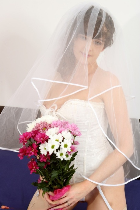 Beautiful bride Kate Anne unveils her big boobs & her shaved pussy on her bed
