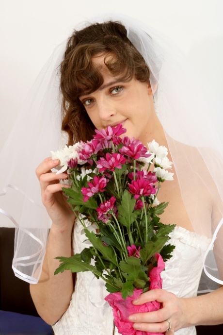 Beautiful bride Kate Anne unveils her big boobs & her shaved pussy on her bed