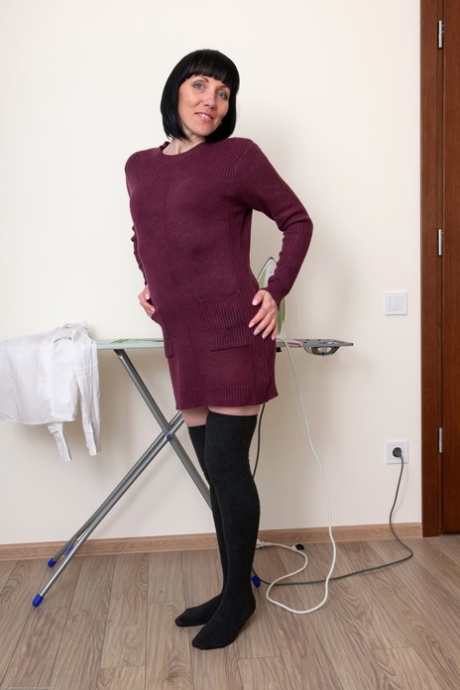 Hot Ukrainian MILF Cherry Despina strips and fingers herself in a solo