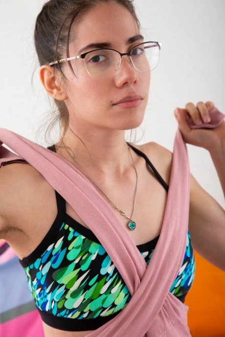 Australian nerd Paola G teases with her sizzling body and bushy snatch