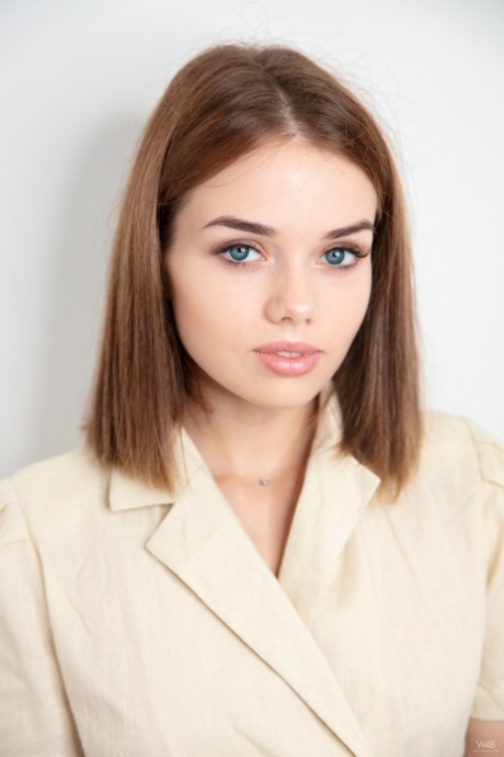 Glamorous teen Keira Blue strips her sexy coat off and spreads her cute beaver