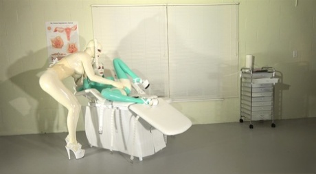 Kinky Latex Lara in full body latex gets toyed by a busty latex-clad doctor