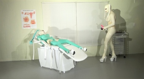 Kinky Latex Lara in full body latex gets toyed by a busty latex-clad doctor