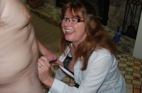 Kinky granny treats a fat cock to an arousing blowjob until it ejaculates
