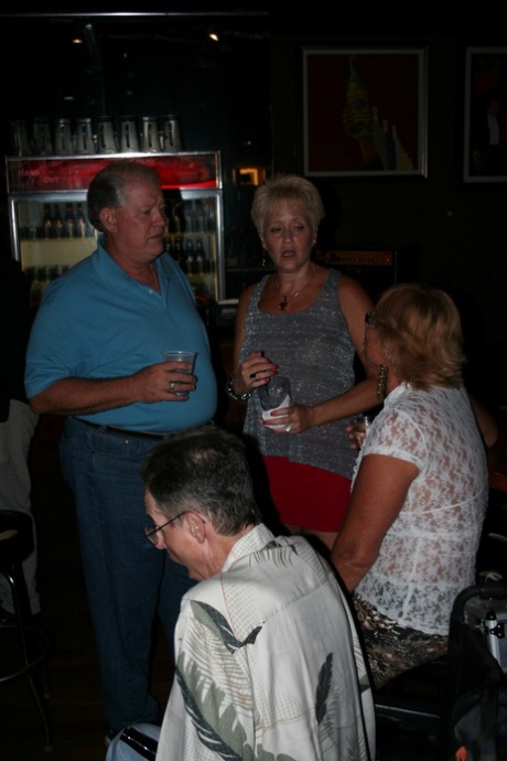 Mature wife Double Dee & her naughty GFs showing their titties in a club