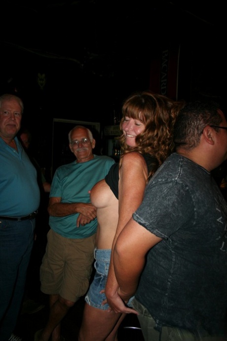 Mature wife Double Dee & her naughty GFs showing their titties in a club