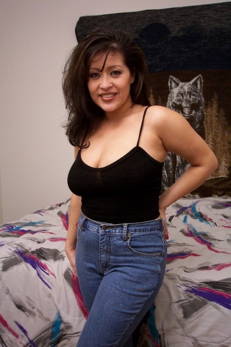 Attractive Latina amateur Misty Mendez shows her huge tits and rubs her snatch