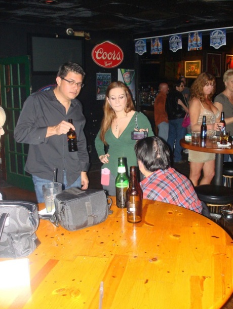Sexy amateur wives show off their big tits and pussies at a nightclub