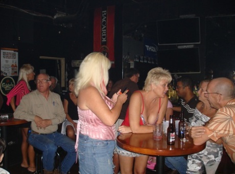 Mature sluts give arousing pantyless upskirts & show their titties in public