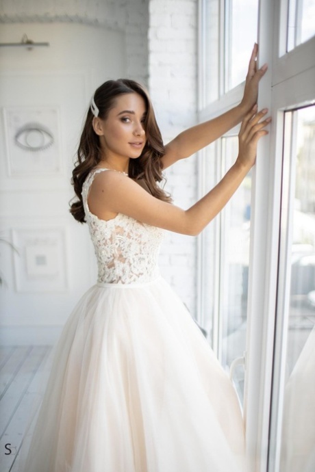 Beautiful teenage bride Medina strips to her stockings & teases with her tits