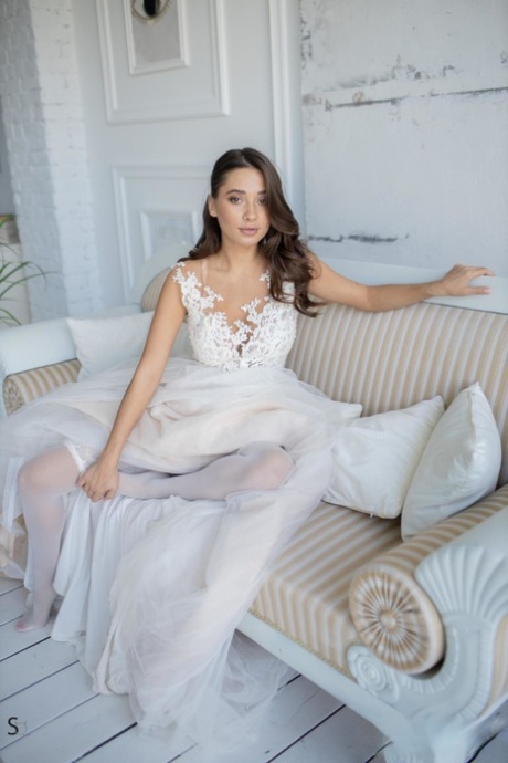 Beautiful teenage bride Medina strips to her stockings & teases with her tits