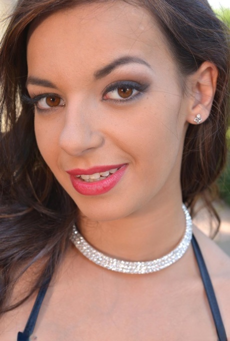 Brunette babe Sophia Laure unveils her lovely big tits & a buttplug in her ass