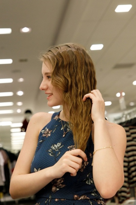 Nerdy amateur babe Melody Marks exposes her big boobs at the mall