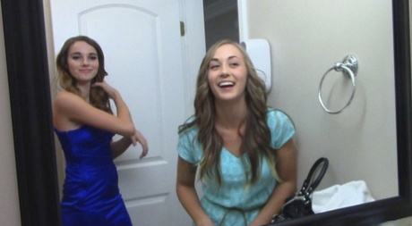 Beautiful lesbian friends undress, kiss and cuddle in their bedroom