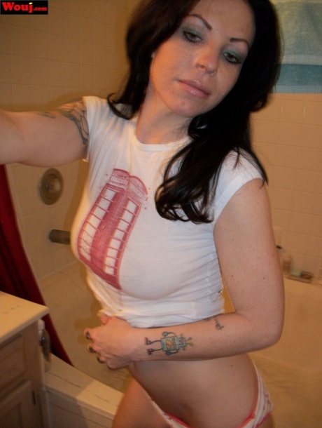 Brunette babe posing for selfies and showing her big booty in cotton panties