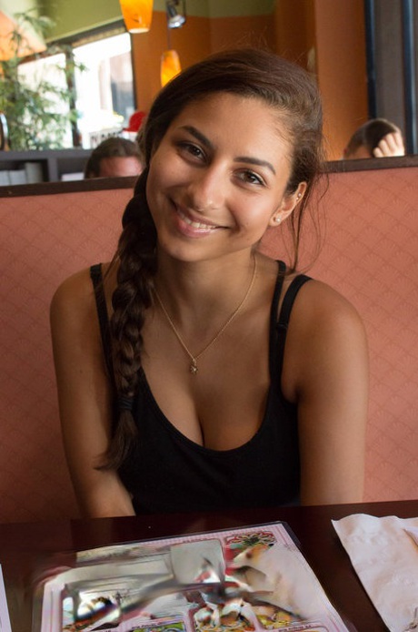 Cute teen girlfriend Nina North flaunts beautiful tits and poses on the bed